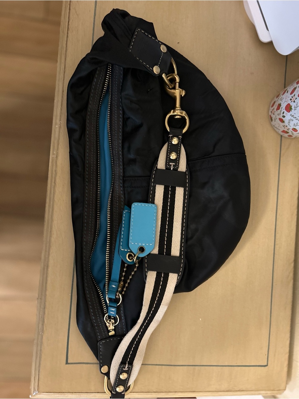 Vintage Coach Black Nylon Crossbody with Blue Interior and Striped Cream Strap.